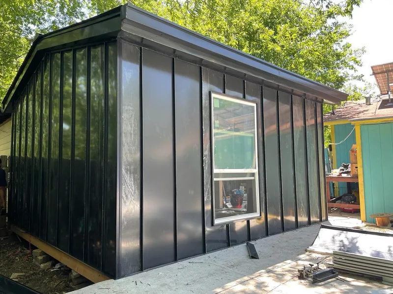 Black standing seam metal wall panels for Metal Roof Installation in Floral Park