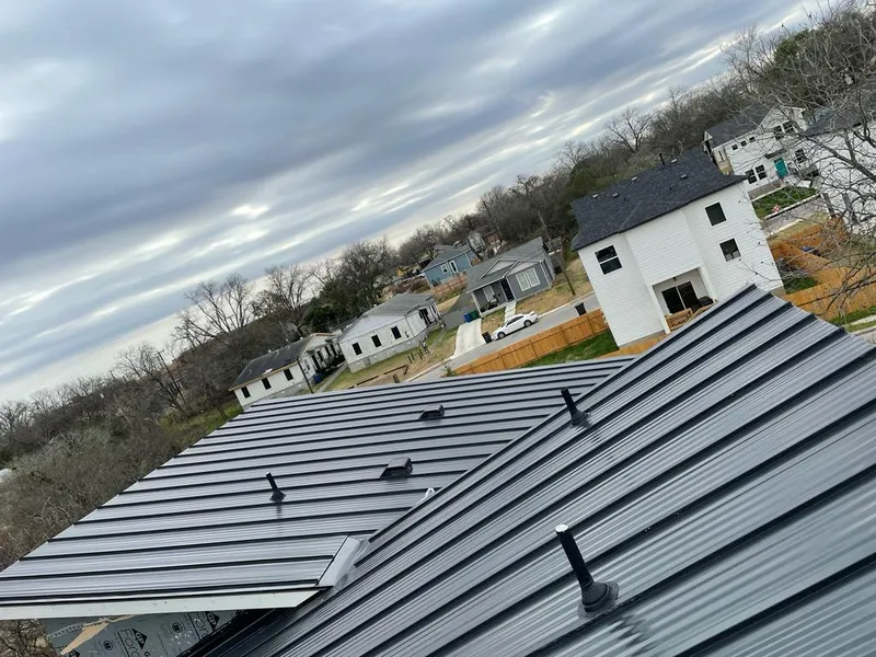Standing seam metal roof panels with vents for Skylight Repair in Floral Park